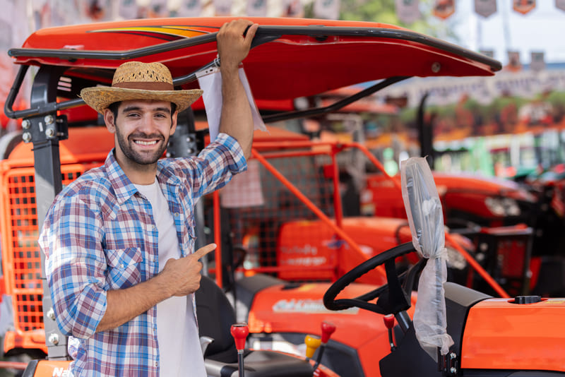 Comprehensive guide for purchasing a tractor, covering essential features, types, and tips for making an informed decision.