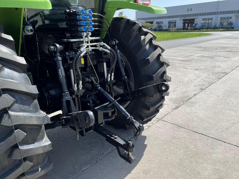 A detailed view of a farm tractor's hydraulic system, showcasing its components and functionality in agricultural operations.