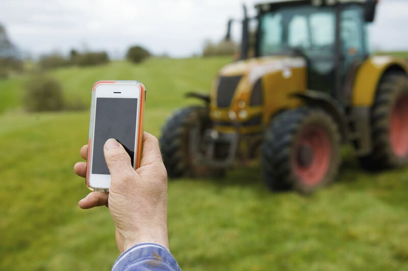 A farm tractor equipped with GPS technology, enabling precise navigation and field mapping for efficient farming.
