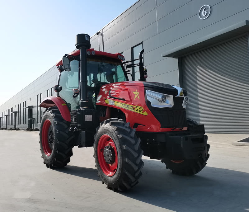 A farm tractor with a sound-insulated cab, designed to minimize engine and implement noise for a quieter, more comfortable operator experience.
