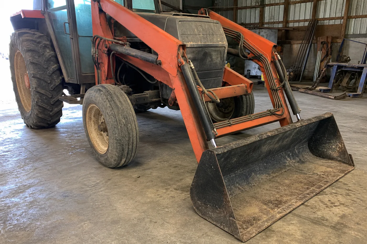 A grounded loader with no visible puddle